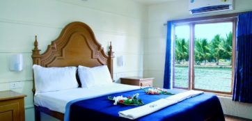 Luxurious bedroom in alleppey houseboat