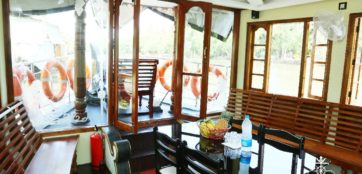 Glass covered area in alleppey houseboat