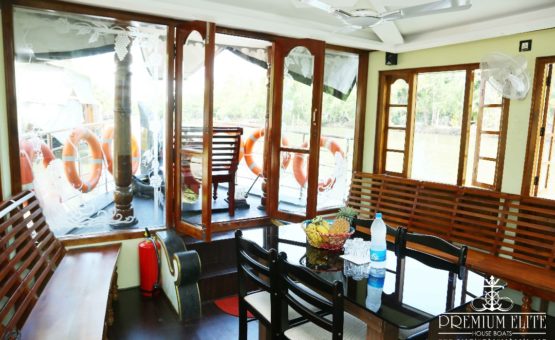 Glass covered area in alleppey houseboat